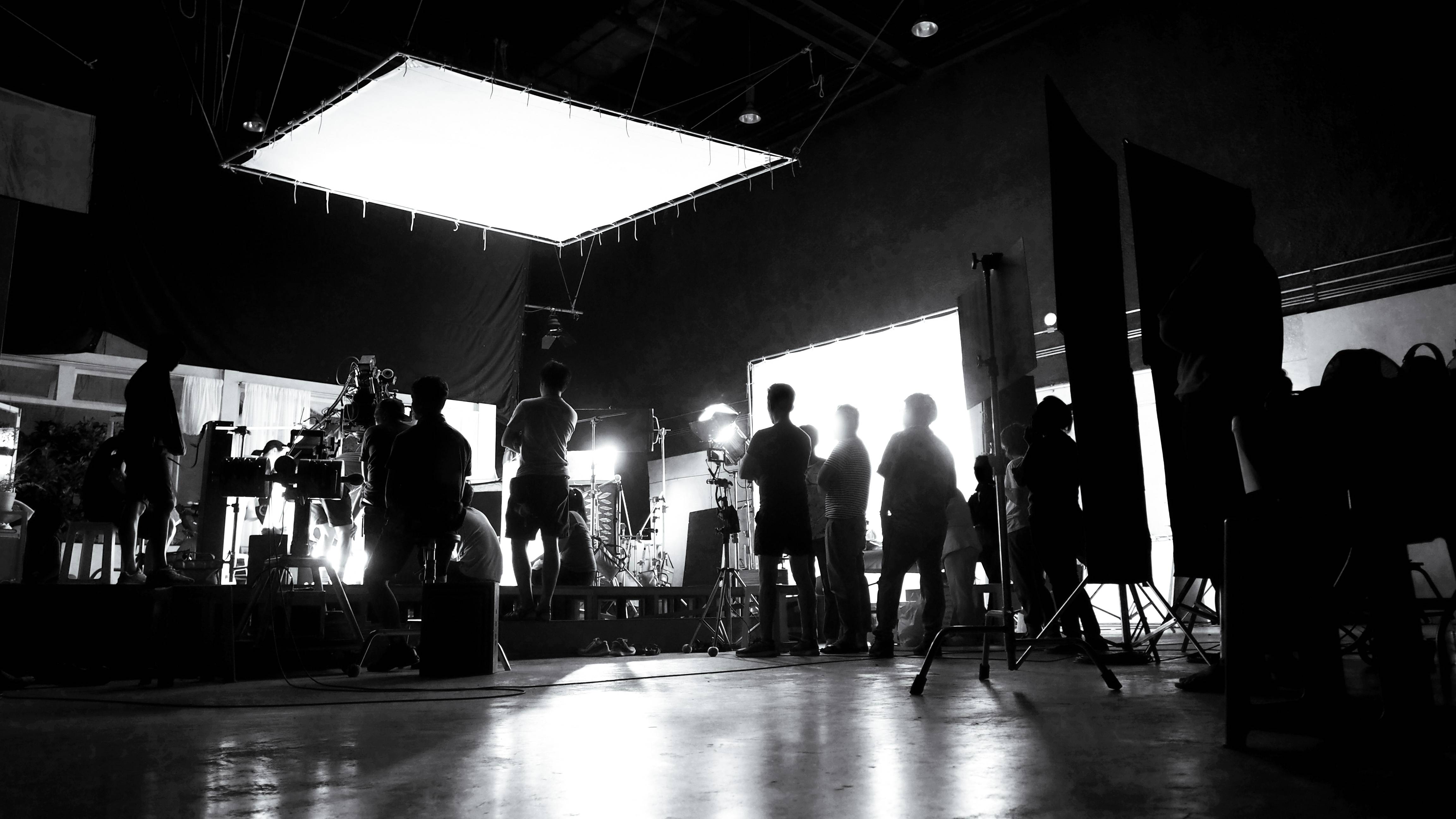 Behind the scenes of video production team silhouette